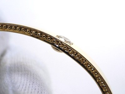 立て爪リングをリフォームしてダイヤ入りの１８金バングルを作る